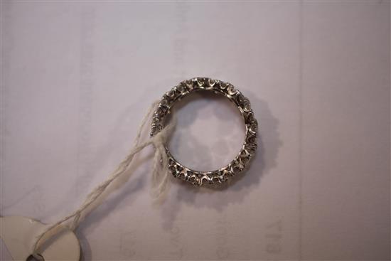 A white gold and diamond full eternity ring, size L.